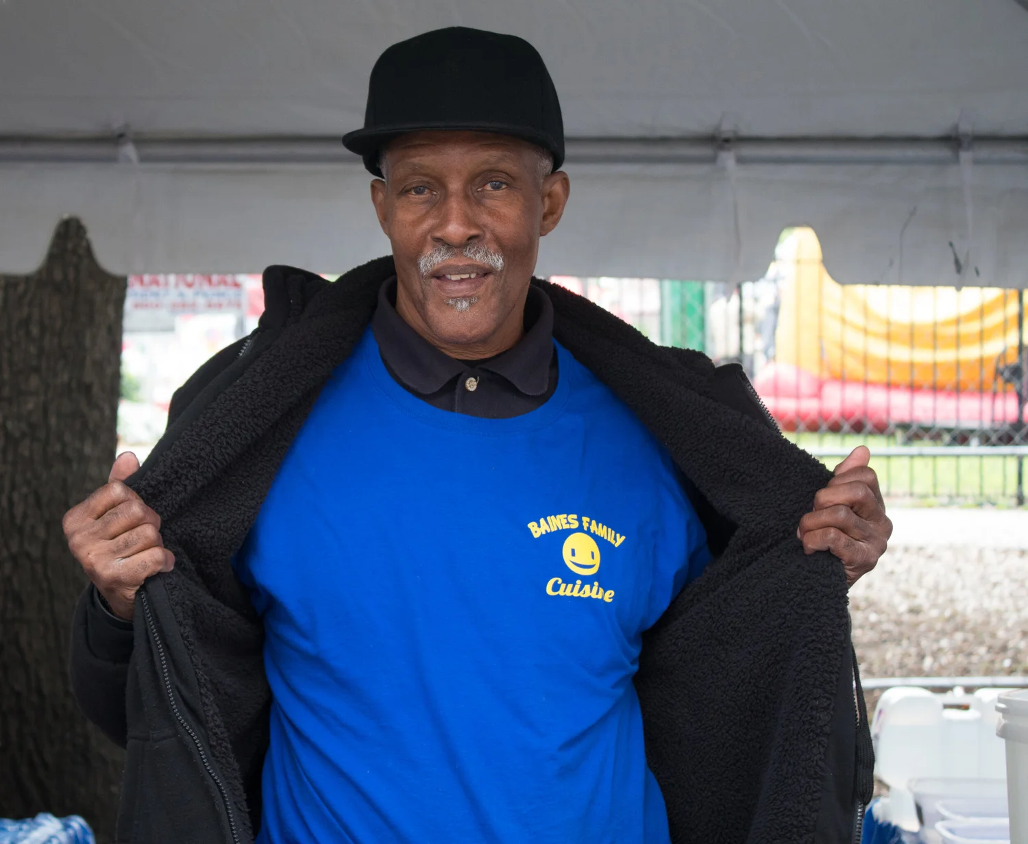 Baines Family Cuisine owner at an outdoor vendor event